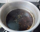 A picture of step 1 of Rosho Puli Pithe with Khejur Gur.