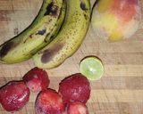 A picture of step 1 of Fruit Chaat With Mosambi Tang Twist 😋🍌🍓🍑.