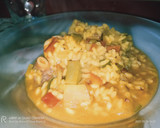 Foto del paso 7 de la receta: Arroz meloso de pulpo y alcachofas