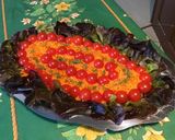 Une image de l'étape 9 de Salade de carottes, tomates et feuille de chêne rouge.