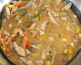 A picture of step 12 of Authentic Thai Red Chicken Curry.