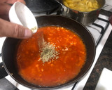 Foto del paso 5 de la receta: Tortellinis relllenos de berenjena en salsa de tomate y queso cheddar