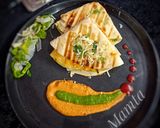 A picture of step 11 of Tandoori paneer tikka grilled tortilla wrap.