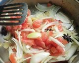 A picture of step 4 of Tomato rice with chicken and salad.