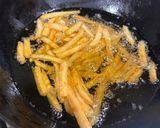 A picture of step 1 of Crispy honey chilli potato.