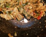 A picture of step 7 of Egg kothu chapati.