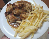 Foto del paso 10 de la receta: Jamoncitos de pollo adobados y asados en freidora de aire con salsa de Cola-Cola y papas fritas