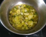 A picture of step 2 of Mumbai style batate pohe.