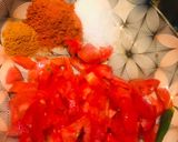 A picture of step 2 of Chicken aalu salan.