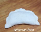 A picture of step 10 of Dudh Puli Rice dumplings cooked in milk.