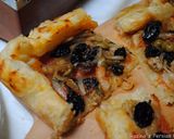 A picture of step 12 of Puff pastry pizza with Raisins & bell pepper.