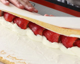 A picture of step 13 of Strawberry Swiss Roll Cake.