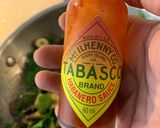 A picture of step 3 of Palak Tabasco sauté veggie.