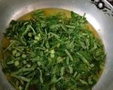 A picture of step 2 of Kochu Pata Chingri.