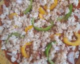 A picture of step 5 of Steam besan pizza cutlats.