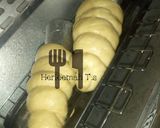 A picture of step 5 of Chicken and potato cornet.