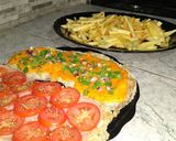 Foto del paso 3 de la receta: Milanesa con cheddar y con jamón y tomates