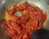 Foto del paso 6 de la receta: Piquillo rellenos de pechuga de pollo con jamón dulce y queso
