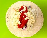 A picture of step 4 of Spicy Chicken Tortilla Wraps.