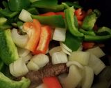 A picture of step 4 of Slow Cooker Mackie Cheese Steak.