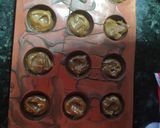 Foto del paso 4 de la receta: Bombones de chocolate y dulce de leche con nuez
