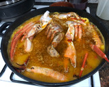 Foto del paso 7 de la receta: Arroz con cuerpos de centollo o cangrejo, cigalas, almejas y calamar