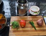 A picture of step 1 of Besan onion tomato chilla.