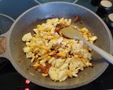 A picture of step 4 of Madurai egg kari dosa.