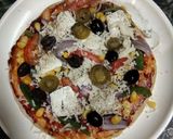 A picture of step 3 of Cheesy paneer pizza.