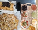 A picture of step 6 of Easy Nachos with Vegetables and Beans.