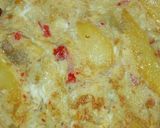 A picture of step 2 of Chips in fried egg.
