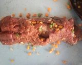 A picture of step 5 of Vegetable stuffed orange beef.