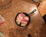 A picture of step 7 of Jalapeño bacon wrapped chicken roll ups.