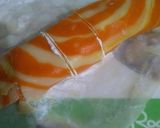 A picture of step 13 of Orange Marble Swiss Roll.