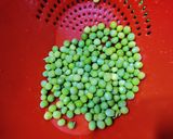 A picture of step 1 of Soya granules with potato and fresh green peas.