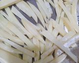 A picture of step 1 of Fries cottage with cheese.