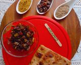 A picture of step 12 of Kareele with roti.