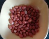 A picture of step 2 of Chickpeas dahi Bara stuffed with peanuts.