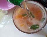 A picture of step 6 of 4 simple iftar drinks/mojito's.