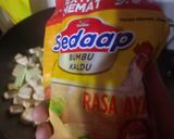 Foto langkah ke 4 dari resep Tumis Labu Tahu Jamur Enoki.