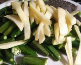 A picture of step 5 of #Tiffin box bhindi with French fries.