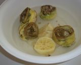 Foto del paso 3 de la receta Medallones de merluza rebozados, setas y alcachofas