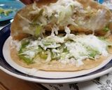 A picture of step 6 of Mexican avocado cheese taco.