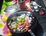 A picture of step 4 of Tawa Bhaji.