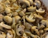 A picture of step 6 of Pork Medallions in a Mushroom and Sherry creamy sauce.
