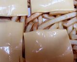 صورة لخطوة 2 من وصفة غراتان بطاطا مقلية 🍟 اسكالوب والجبن🧀
