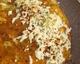 A picture of step 5 of Italian cheese and herbs omelette.