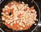 A picture of step 11 of Fateera with hotdog filling.