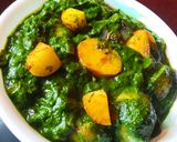 A picture of step 5 of Baby potatoes in green gravy.