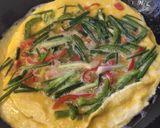 A picture of step 1 of Veggie Omellete.